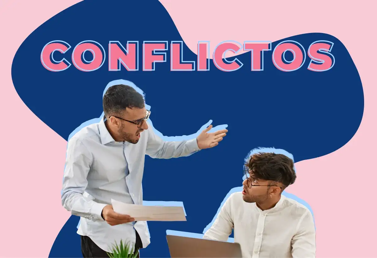Dos compa&ntilde;eros discuten acaloradamente. Aprende c&oacute;mo resolver conflictos laborales entre compa&ntilde;eros para mejorar el ambiente de trabajo.